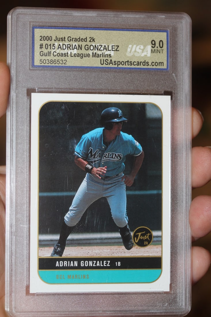 Graded Adrian Gonzalez Rookie Card: as shown on photos