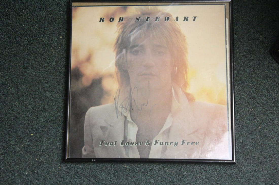 A Signed Rod Stewart Album: framed - however, not examined out of the frame - overall= 12 3/4"