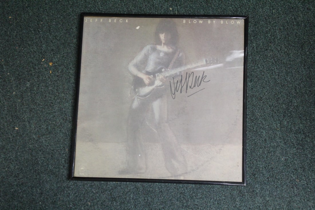 A Signed Jeff Beck Album or Album Cover: framed - however, not examined out of the frame - overall= 12 3/4"