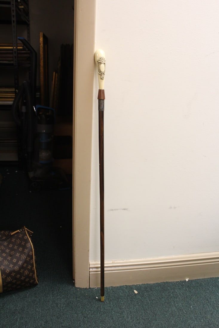 A Carved Handle Cane: most likely 19th century - 38 3/4" long