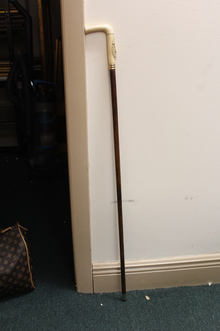 A Carved Handle Cane: most likely 19th century - 37 1/4" long