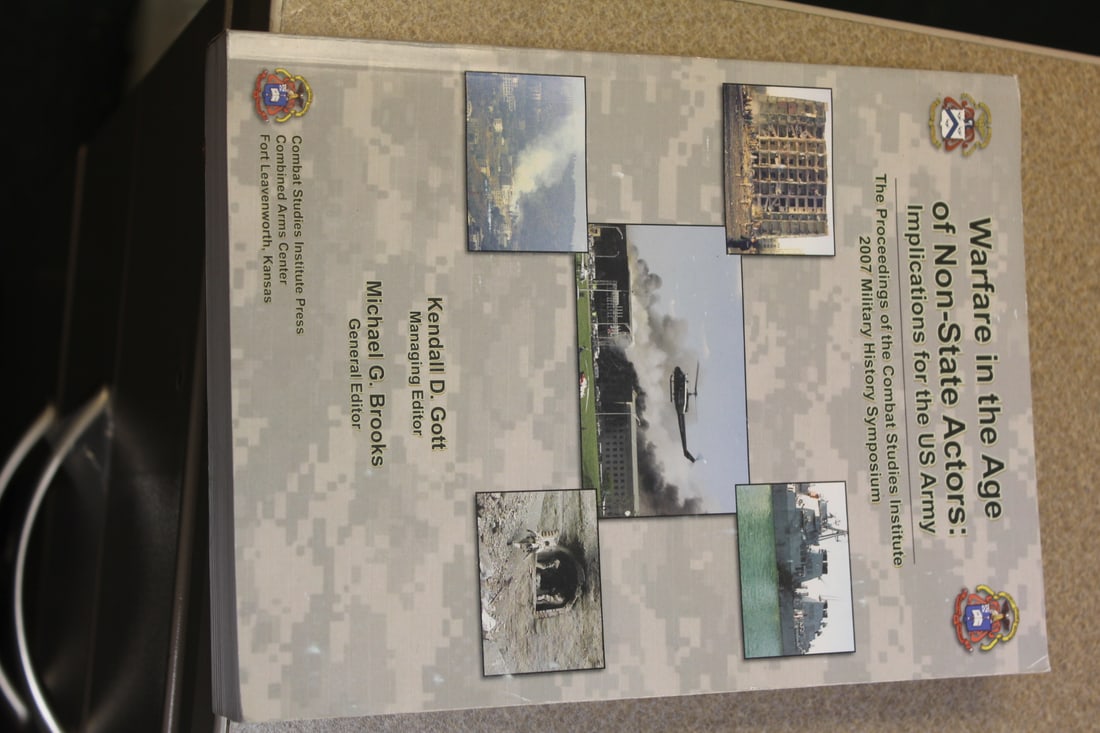 Softcover Book: Warfare in the Age: as shown