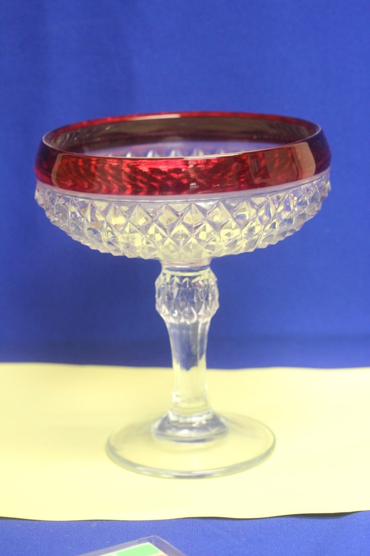 A Cranberry Glass Stem Cup: 7 1/4" tall