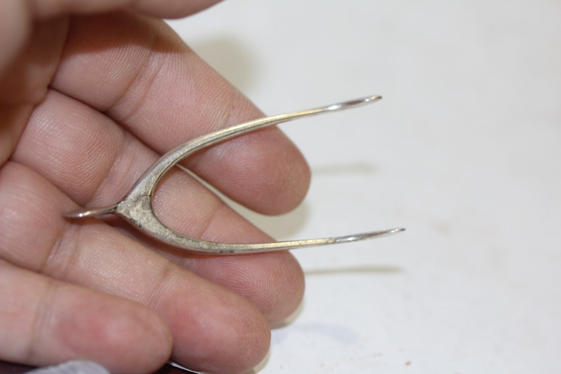 A Sterling Wishbone Clamp or Tong: 2 5/8" across- signed
