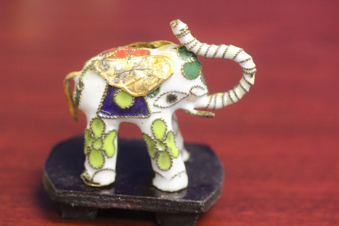 A Cloisonne Elephant on Stand: 2 inches across