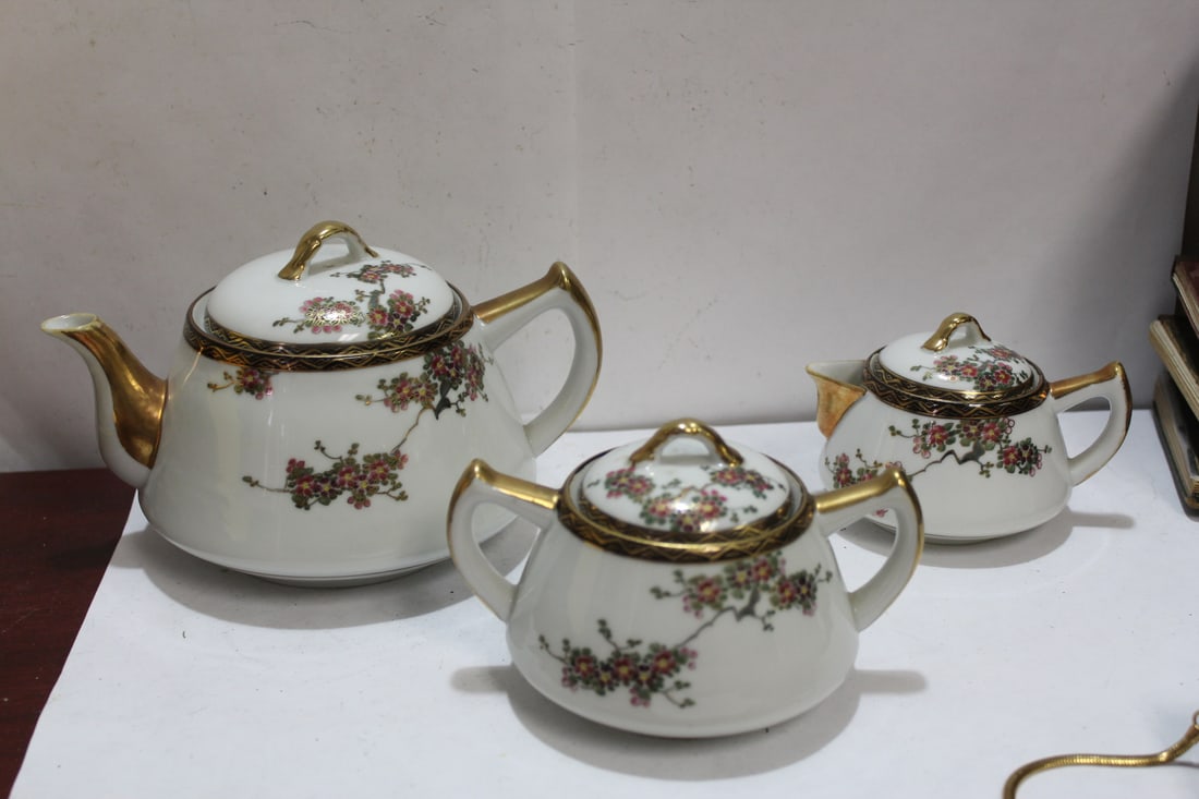 An Antique/Vintage Japanese Kutani Teaset: signed - thinly carved - beautifully done - teapot= 7 1/8" across