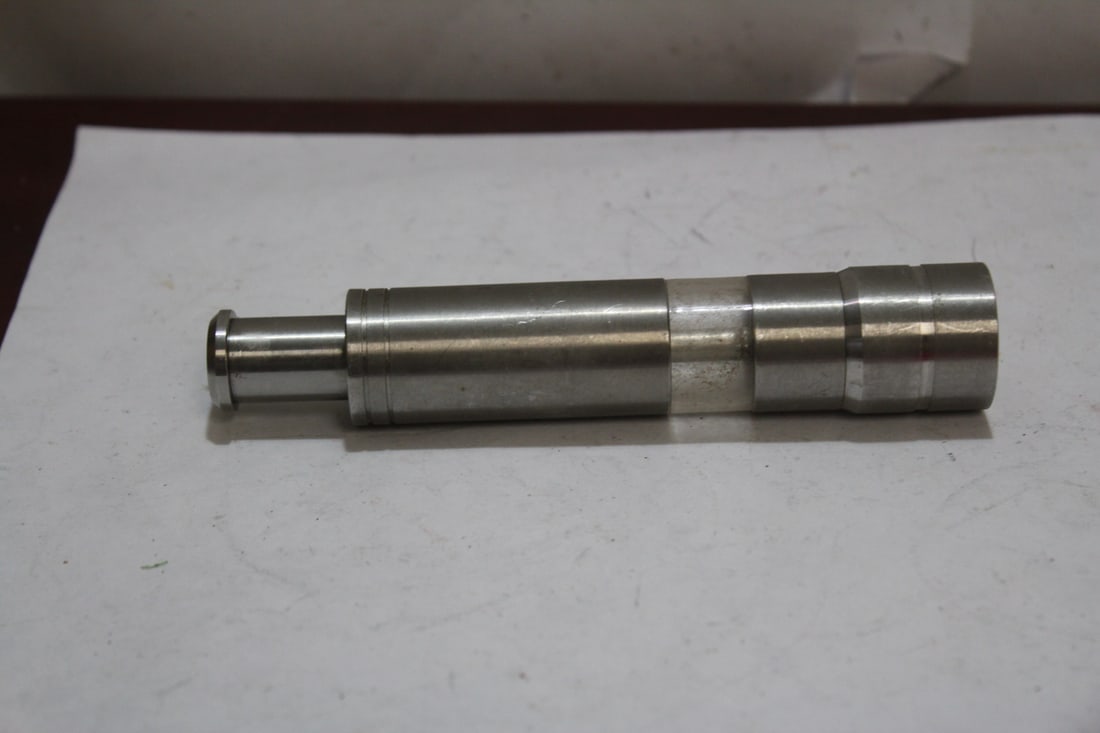A Metal Plunger: 5 1/2" long