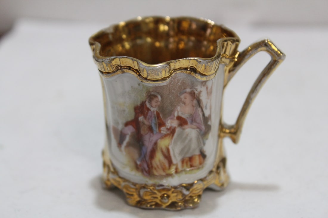 An Antique Dematasse Cup: 2 inches tall