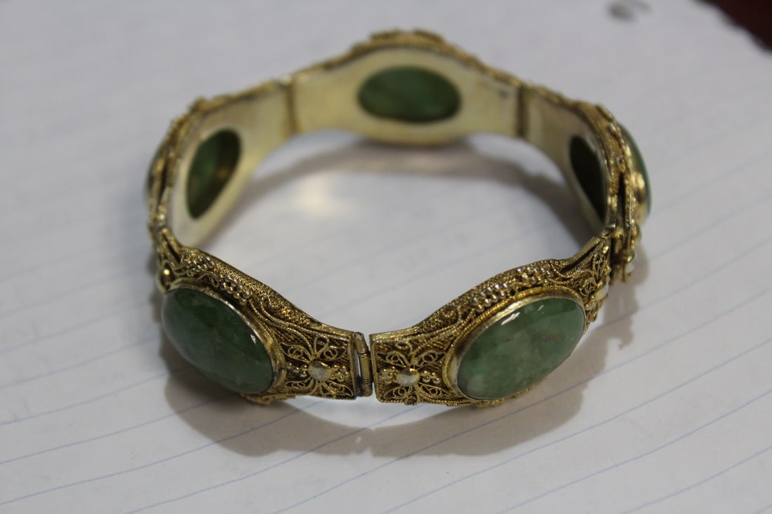 A Chinese Filigree Sterling and Jade Bracelet: antique - 7 1/4" across