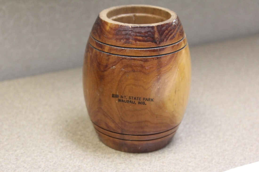 A wooden small barrell: 4" tall