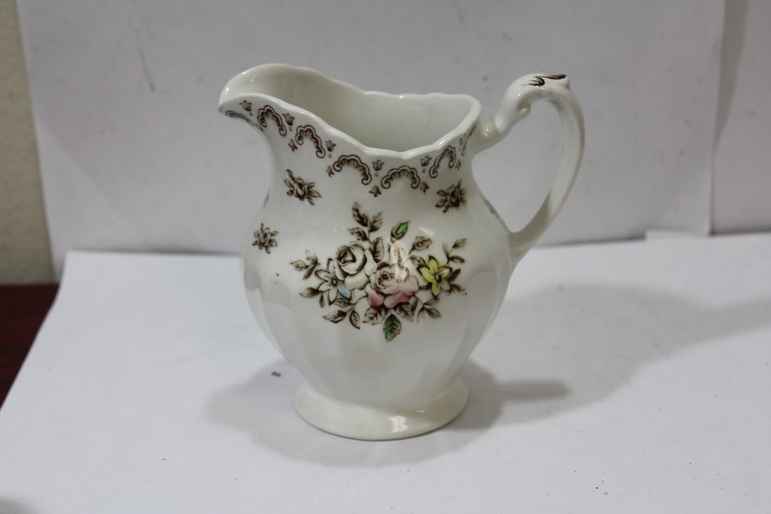 A Ceramic Pitcher/Creamer: 4 3/4" tall