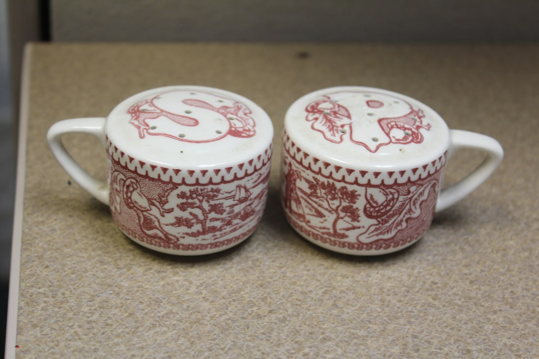 English? Salt and Pepper Shakers: 1 3/4" tall each