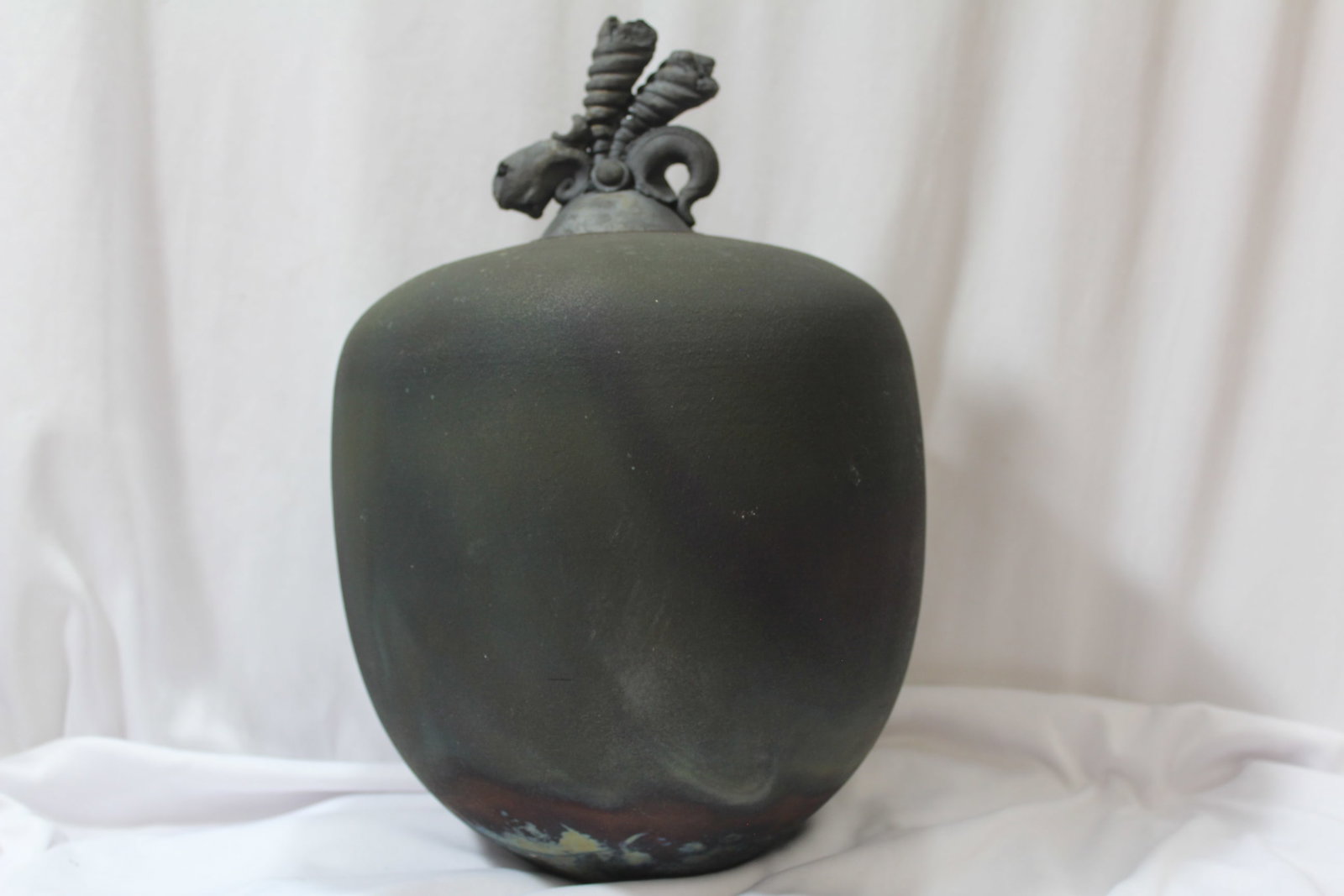 An Artist Signed Raku Vase: 13" tall - please note: lid has roughness