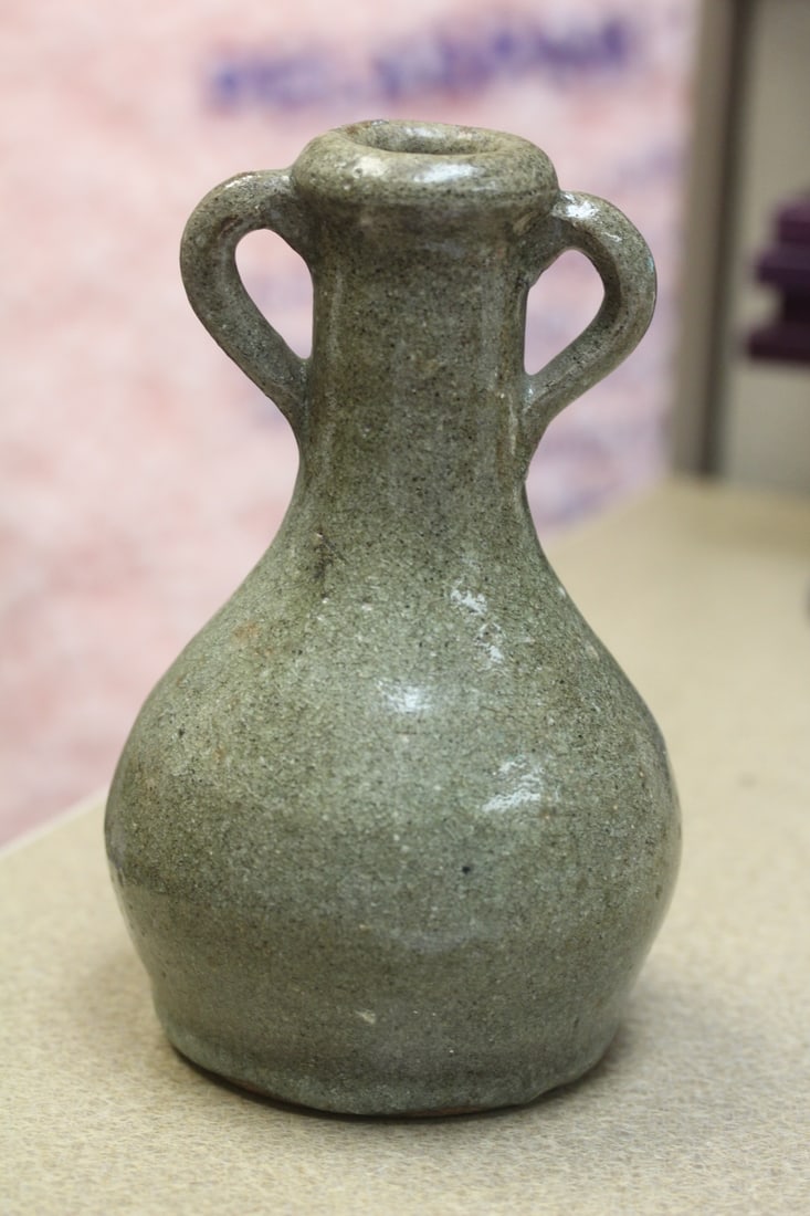 Possibly Antique Pottery Bottle: 7 inches tall - however exact age unknown, but appeared to be old