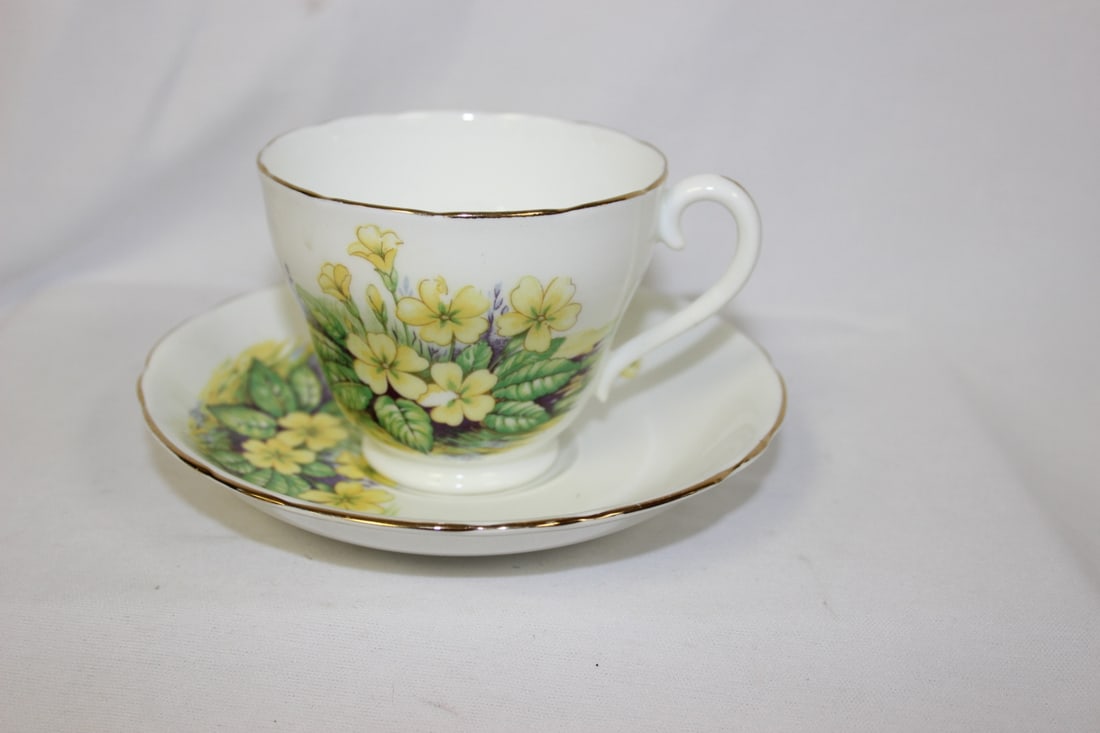 An Adderley Bone China Cup and Saucer: 2 3/4" tall