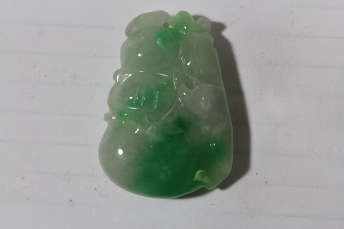 A Jadeite Pendant***: 2 1/8" in length