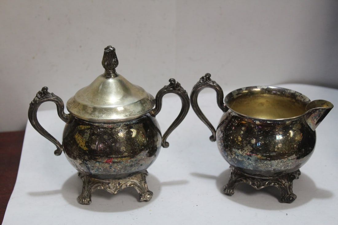 A Silverplated Cream and Sugar Container: sugar container is 5 1/4" tall