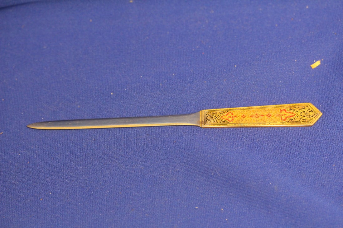 A Well Carved Letter Opener: with sheath - 8 1/4" long