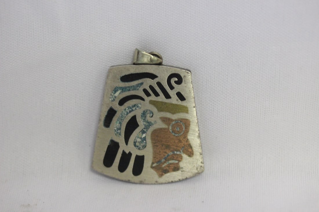 A Sterling Silver Vintage Inlaid Pendant: Taxco-Mexico - marked sterling - looks to be a signed piece - 1 1/2" long, not including the bail