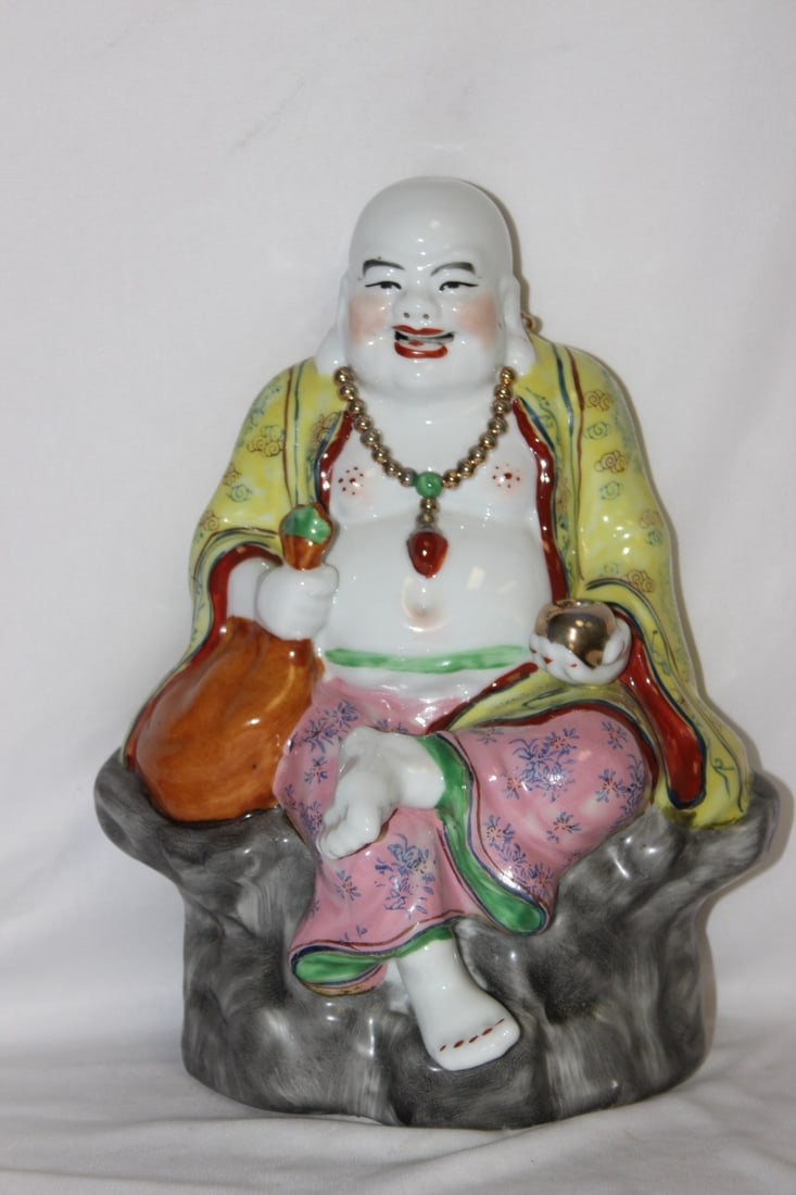 A Signed Vintage Chinese Buddha: 12" tall - porcelain construction - makers mark on the base