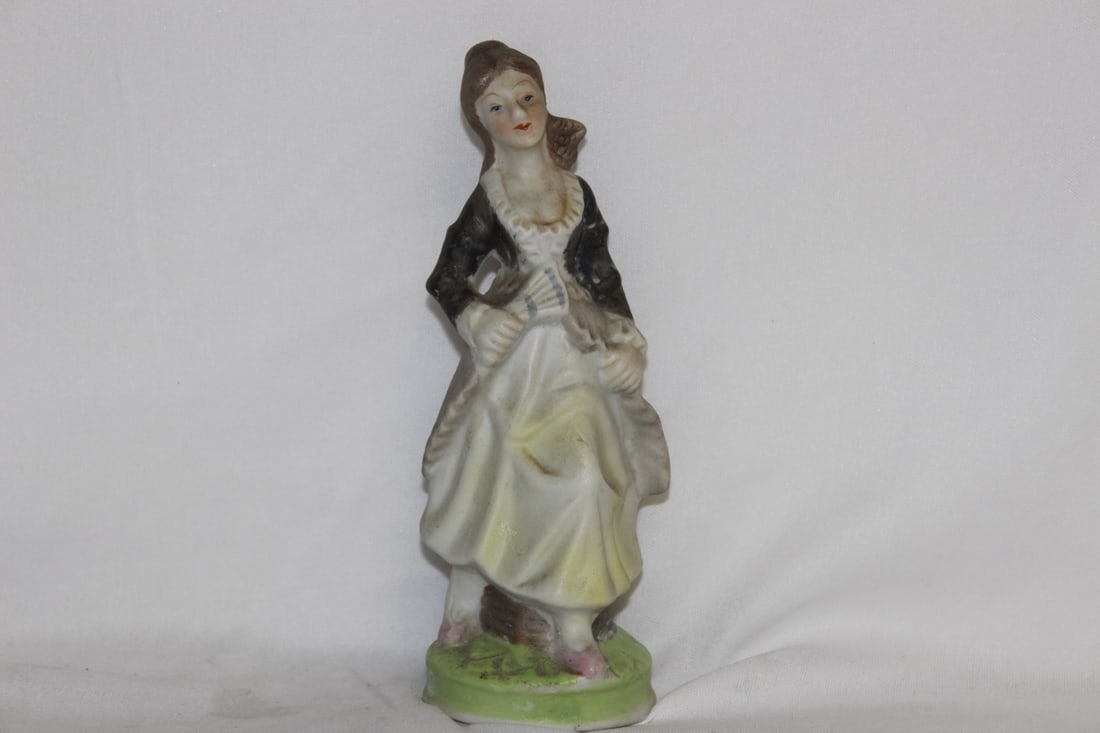 A Vintage Ceramic Figurine: 6 1/2" tall