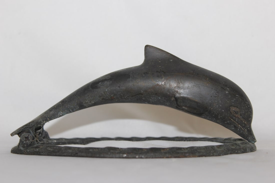 A Metal Dolphin Knocker: 5 3/4" in diameter