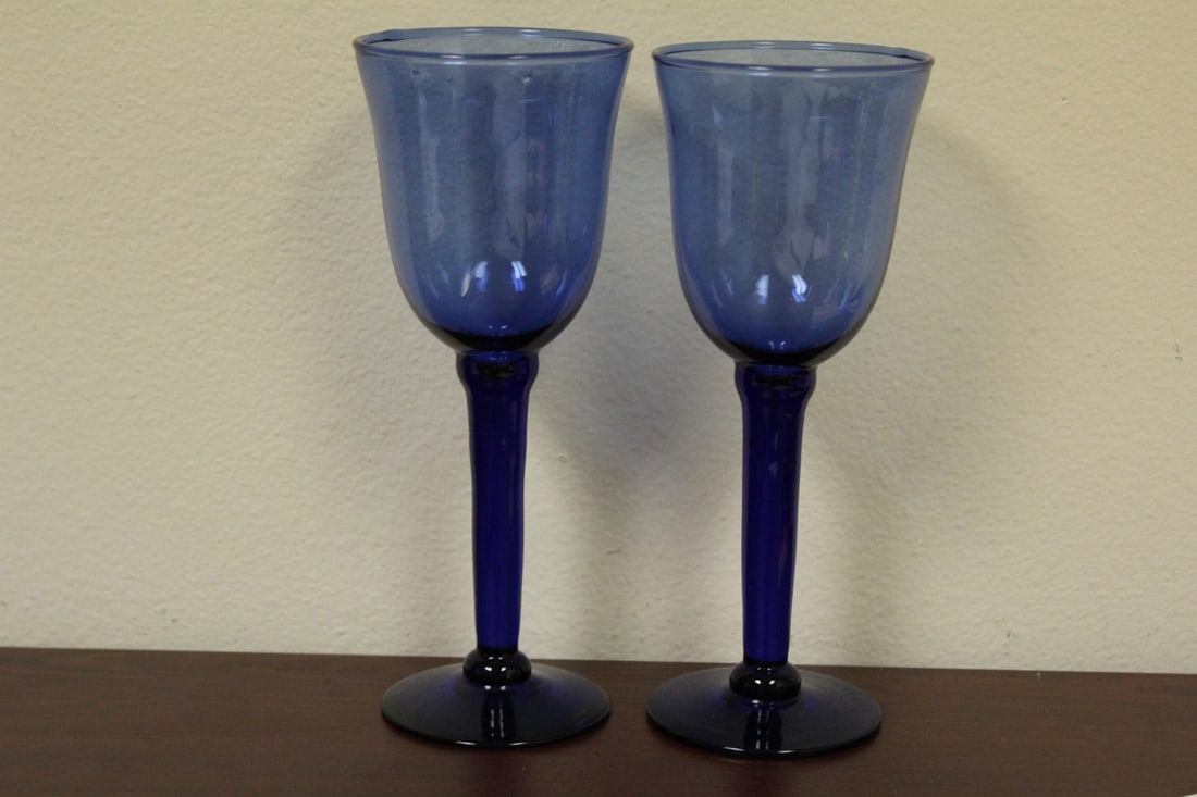 A Pair of Blue Glass Goblets: some manufacturer's imperfection - 9" tall