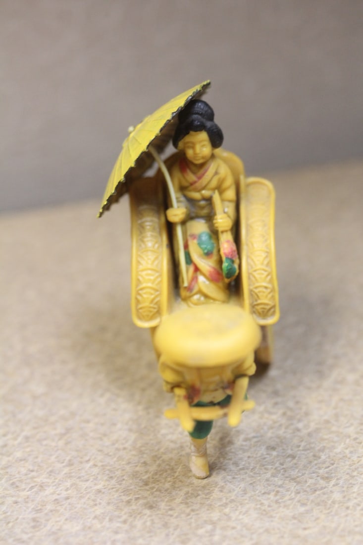 Japanese Celluloid Lady on a Rickshaw: well carved - 3 3/4" long