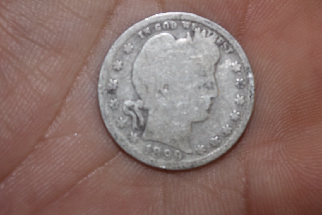 1899 Barber Silver Quarter: as shown