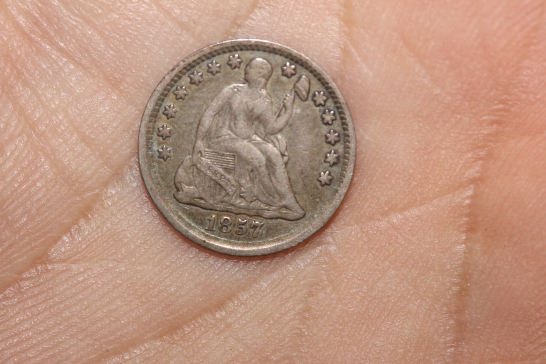1857 Silver Half Dime: as shown