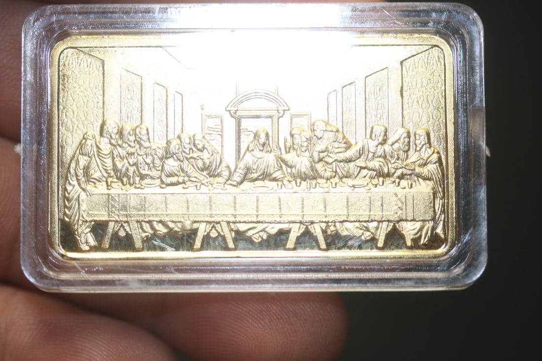 A Gold Plated "Last Supper" Bar: clad - one ounce