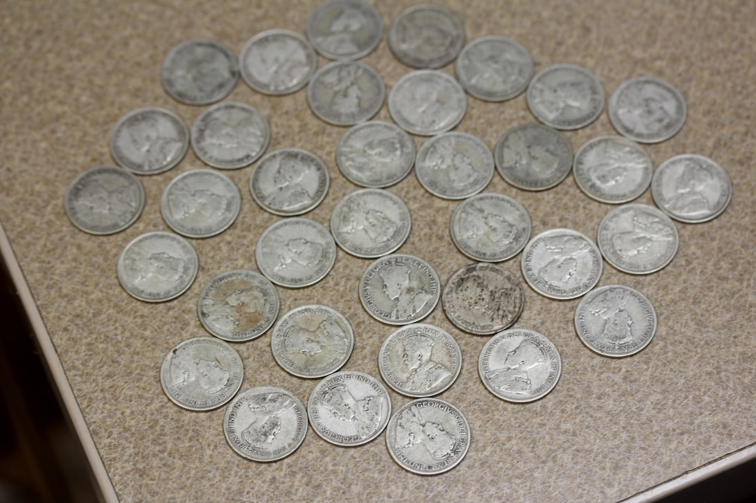 Lot of 36 80% Silver Canadian Quarters: various dates and conditions