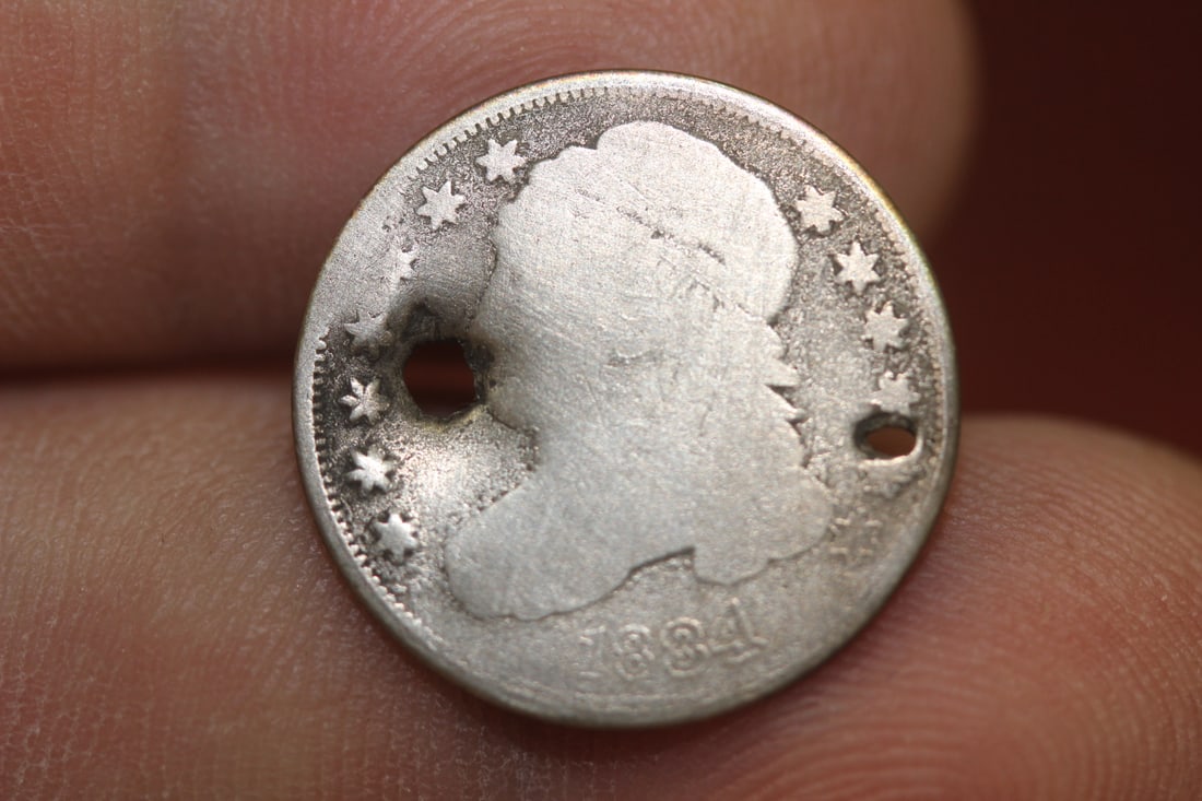 An 1834 90% Silver Dime: please note: hole