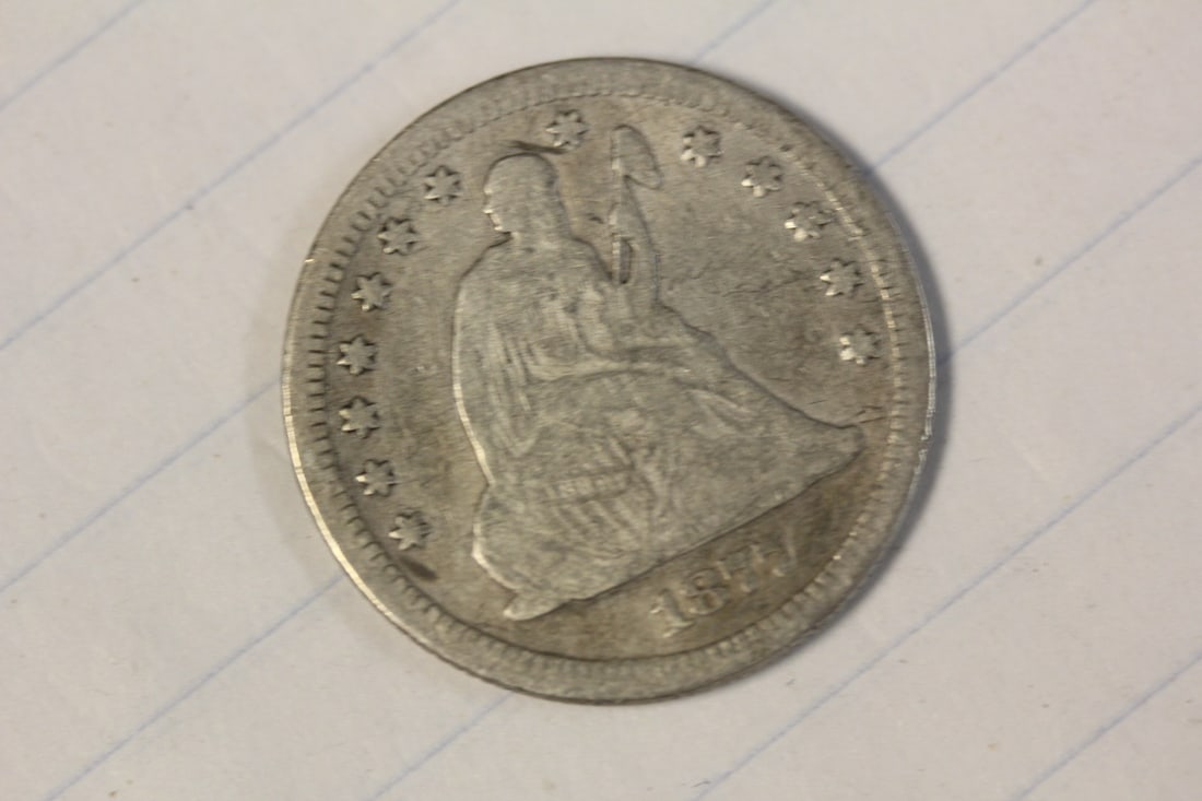 1877 Seated Silver Quarter: as shown