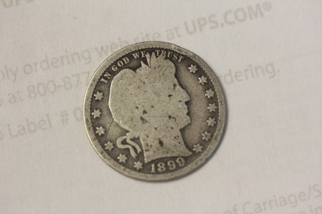 1899 Barber Silver Quarter: as shown