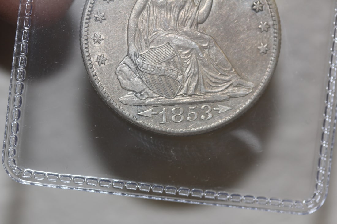 1853-O Seated Half with Rays and Arrows: previous owner grading included, but you will be the final judge on this one
