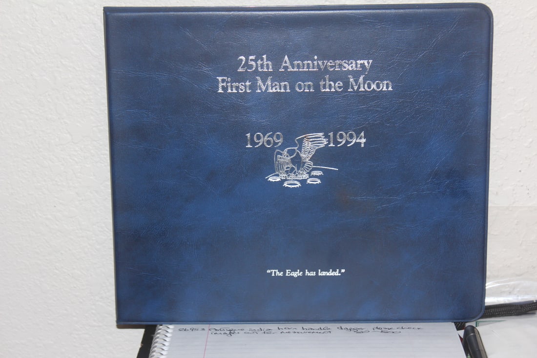 First Man on the Moon Stamp and Coin Set: 25th anniversary First Man on the Moon coins set - 1969-1994 stamp and commemorative coins set