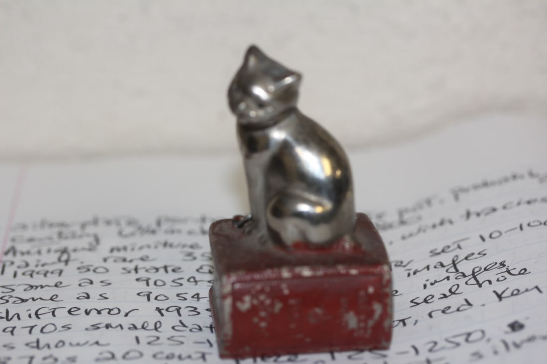 Vintage Cast Iron Cat on Book: possibly a small paperweight - 2 3/4" inches tall