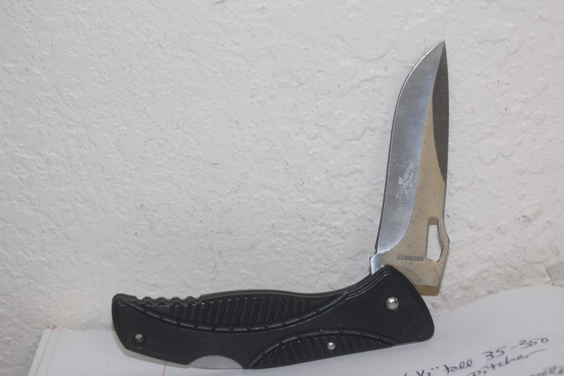 A Pocket Knife: 4 1/2" long when folded