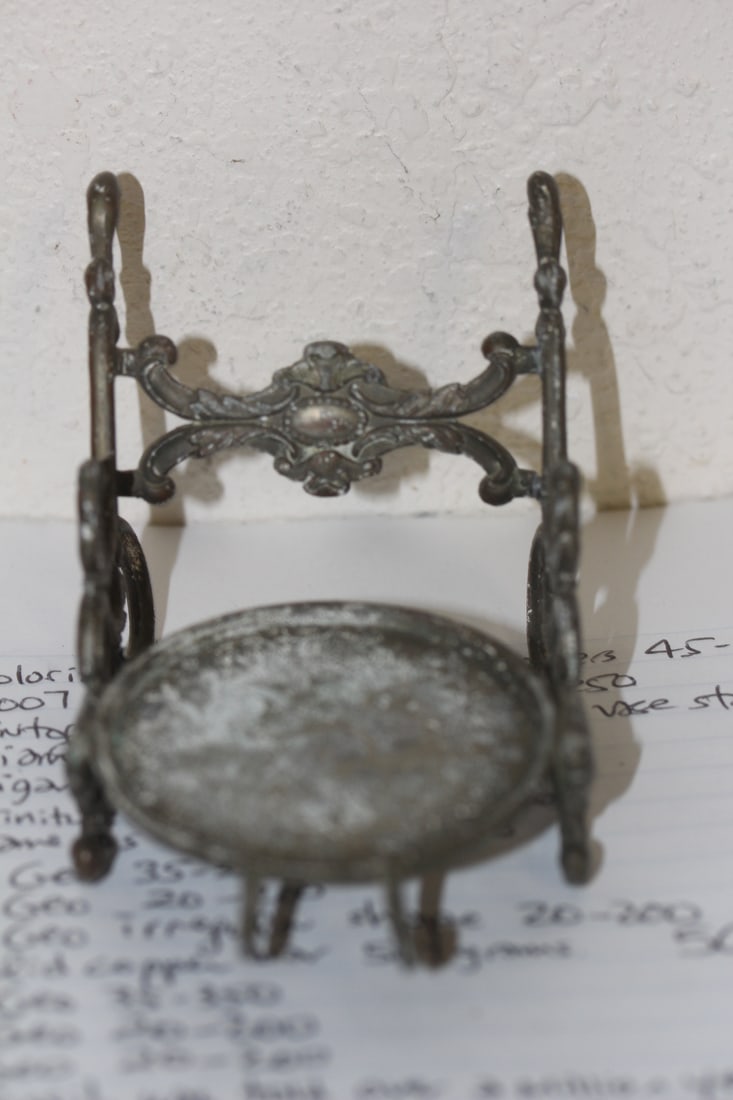 Antique Metal Stand: some sort of metal stand - 4 3/4" across - please note: minor loss/split as shown