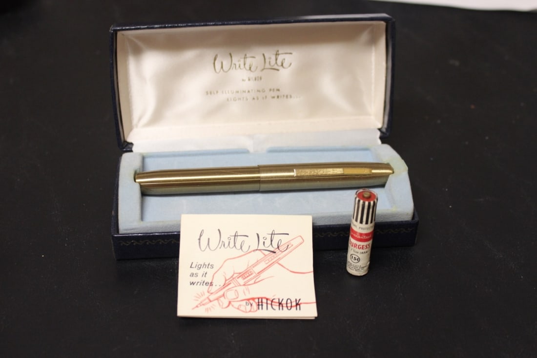 A Vintage Write Lite Pen: Lits when it writes - rare - comes with an extra original battery and box