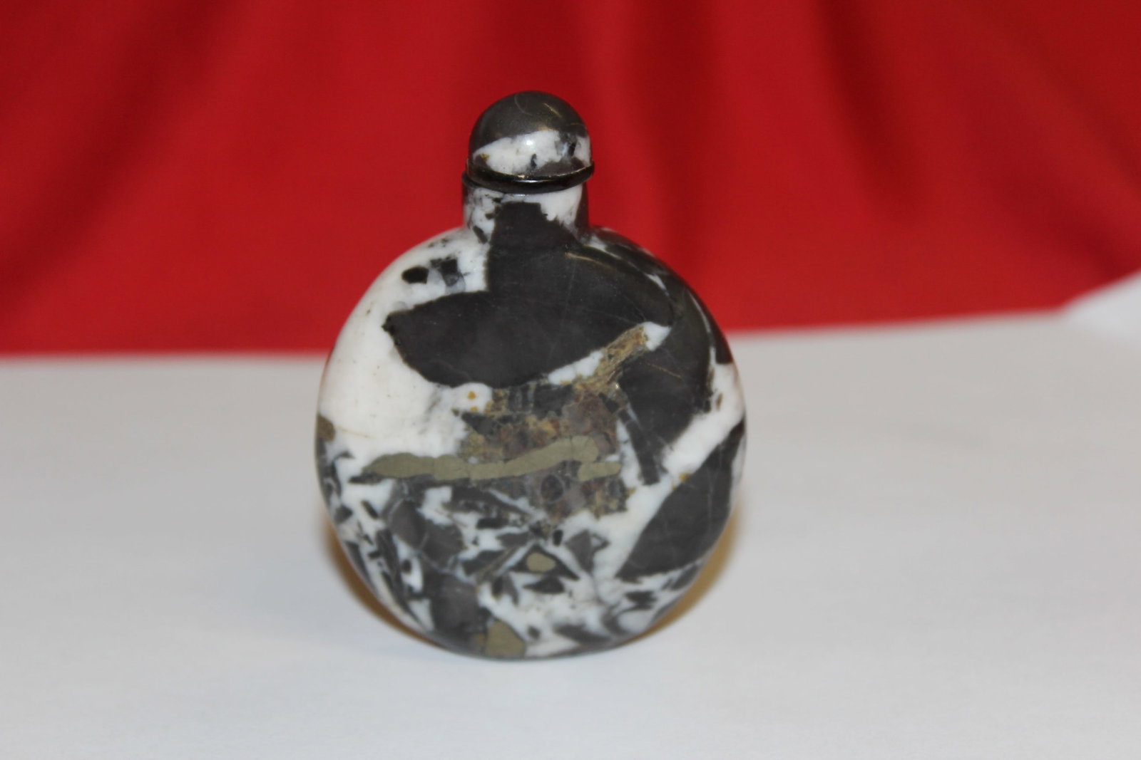 Antique Chinese Pudding Stone Snuff bottle: Circa 19th century. 2 3/4" tall. Well hollowed.