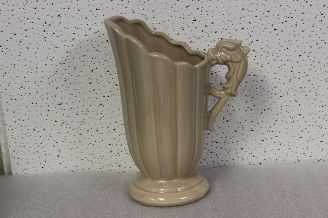 A Shawnee 828 Pottery Pitcher: 8" tall