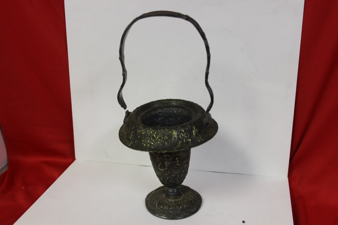 An Ornate Silverplated Reposse Basket: Please note: separation - overall 10 inches tall, including handle - most likely Dutch