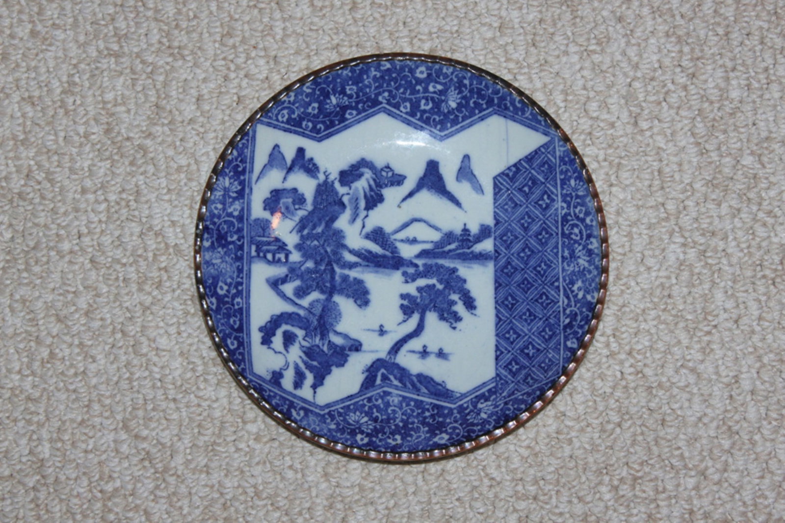 Antique Japanese Imari Blue and White Plate: 19th Century Edo Period. Measures 9 3/4" in diameter.