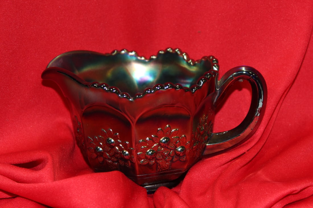 A Carnival Glass Creamer: 5 3/4" acros