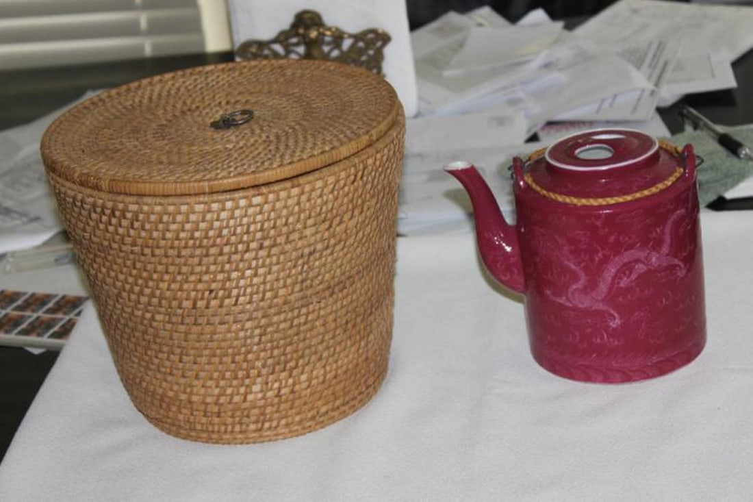 Antique/Vintage Chinese Porcelain Teapot: with Basket - circa early to mid 20th century. Unusual color with dragon motif. Teapot measures 6 1/2" tall. Overall including basket is 8" tall.