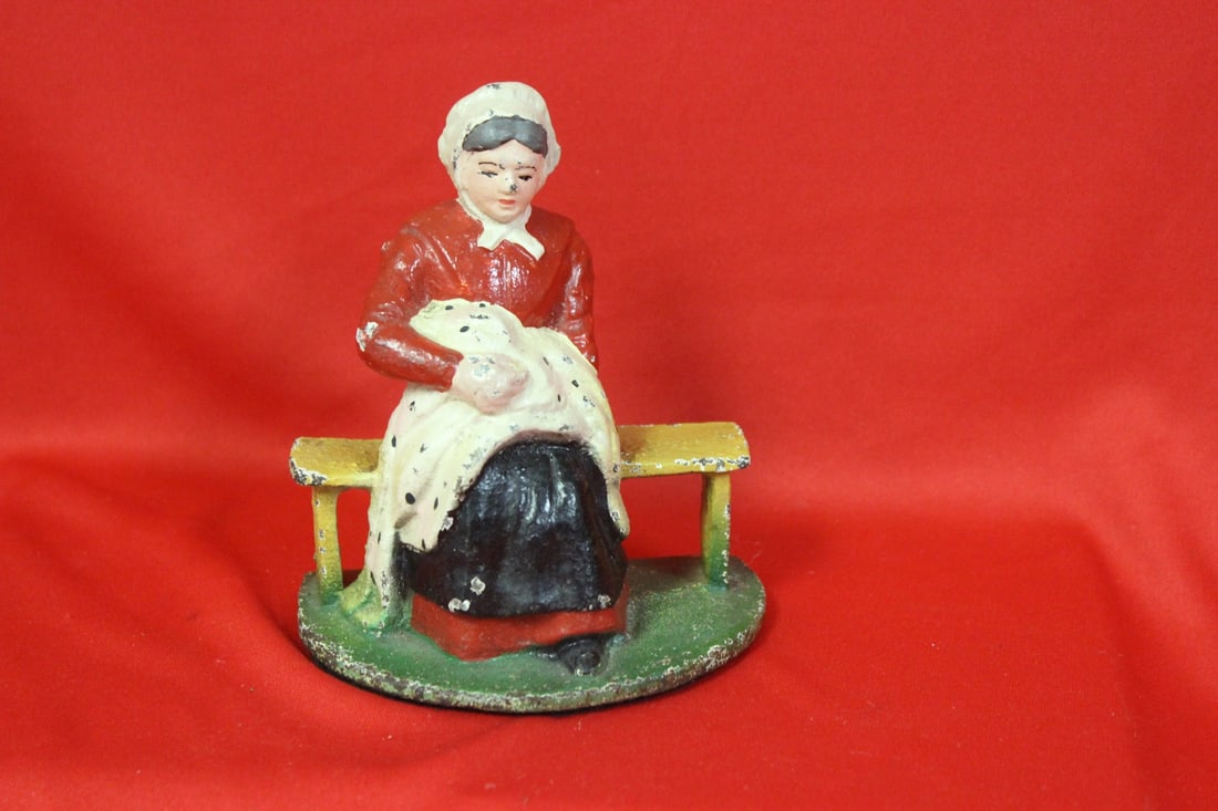 A Vintage Cast Iron Door Stopper: 5 1/4" tall