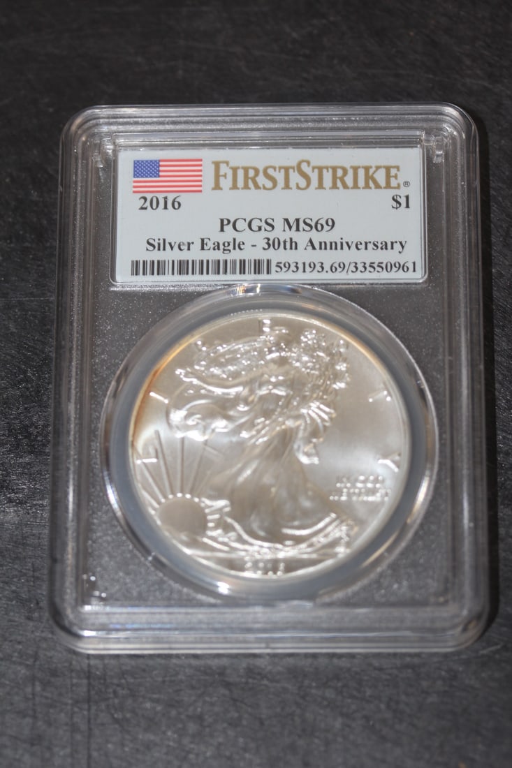 PCGS Graded 2016 Pure Silver Eagle Coin: first strike - nicely toned - MS69