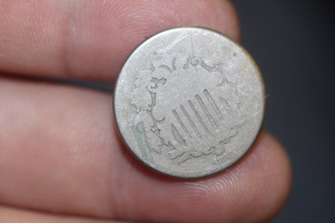 An 1867 Shield Nickel: as shown